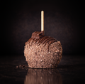  Chocolate-covered Granny Smith caramel apple with crunchy wafer candy topping