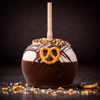     Sweet and salty caramel apple with pretzel and peanut topping